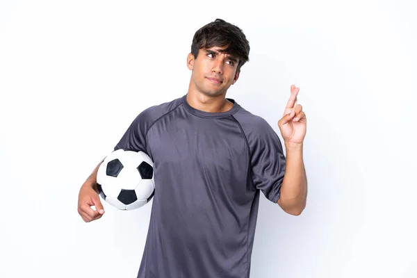 Όμορφος Νεαρός Ποδοσφαιριστής Άνδρας Απομονωμένος Λευκό Φόντο Δάχτυλα Σταυρώνουν Και — Φωτογραφία Αρχείου