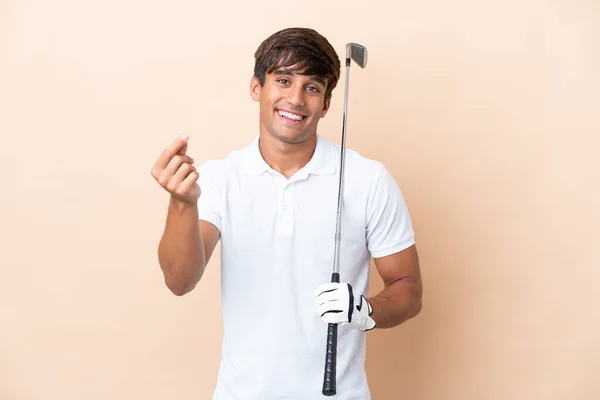 Ung Golfare Spelare Man Isolerad Ocker Bakgrund Göra Pengar Gest — Stockfoto