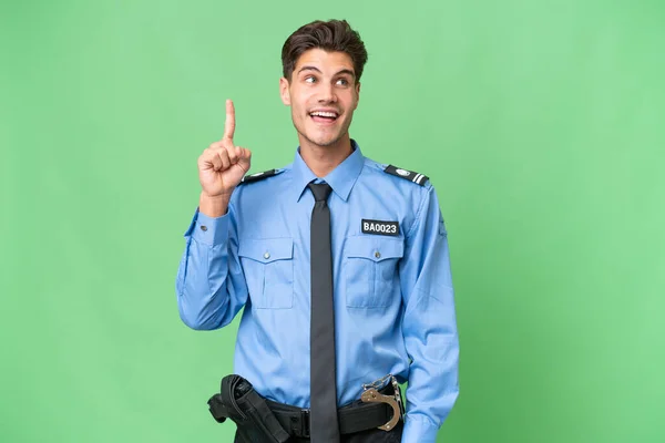 Jovem Policial Sobre Fundo Isolado Com Intenção Realizar Solução Levantar — Fotografia de Stock