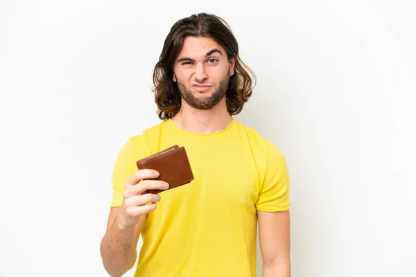 Mladý Pohledný Muž Drží Peněženku Izolované Bílém Pozadí Smutným Výrazem — Stock fotografie