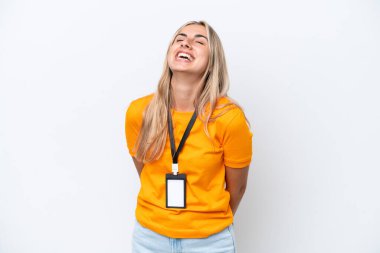 Young caucasian woman with ID card isolated on white background laughing