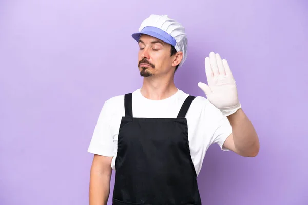Fishmonger Man Wearing Apron Isolated Purple Background Making Stop Gesture — Stock Photo, Image