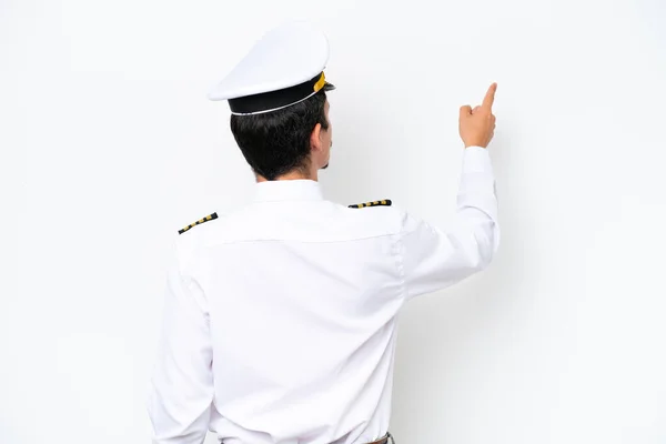 Airplane Caucasian Pilot Isolated White Background Pointing Back Index Finger — Foto de Stock