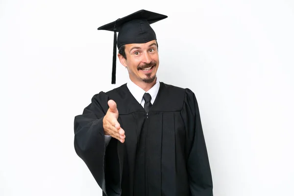 Jovem Universitário Graduado Homem Isolado Fundo Branco Apertando Mãos Para — Fotografia de Stock