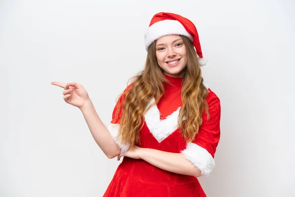 Jovem Caucasiana Com Vestido Natal Isolado Fundo Branco Apontando Dedo — Fotografia de Stock