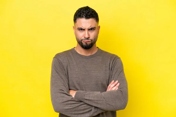 stock image Young Arab handsome man isolated on yellow background feeling upset