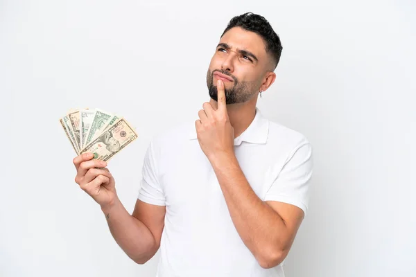 Jonge Arabische Man Neemt Veel Geld Geïsoleerd Witte Achtergrond Met — Stockfoto