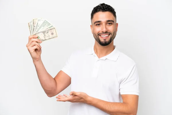 Young Arab Man Taking Lot Money Isolated White Background Extending — Φωτογραφία Αρχείου
