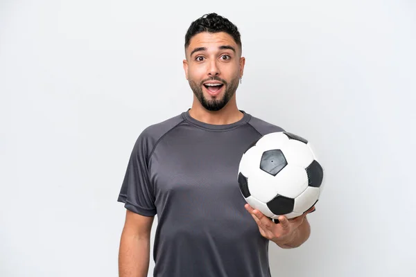 stock image Arab young football player man isolated on white background with surprise facial expression