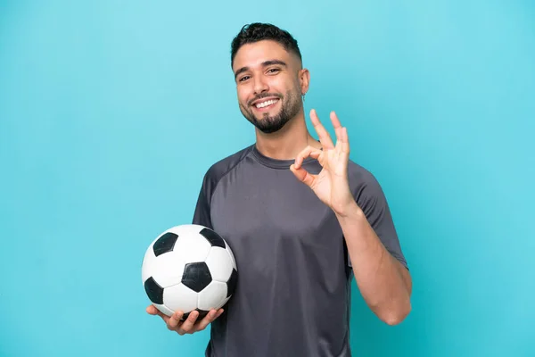Young Arab Handsome Man Isolated Blue Background Soccer Ball Making — Stock Photo, Image