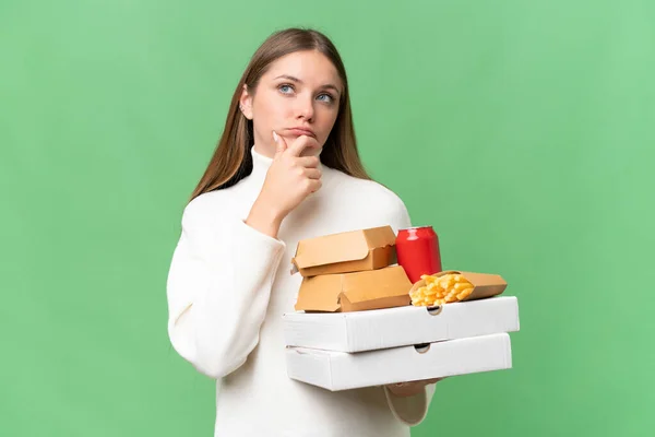 Young Beautiful Blonde Woman Holding Takeaway Food Isolated Background Having — Stock Photo, Image