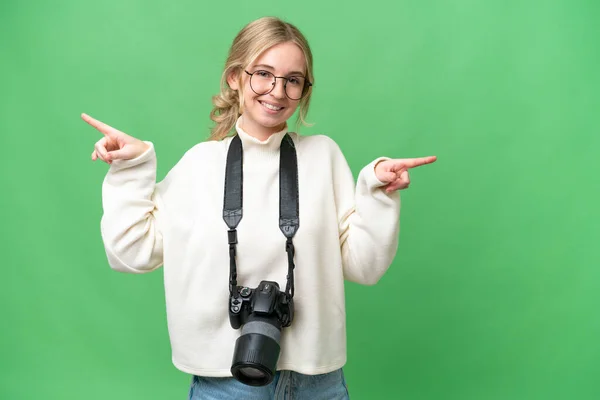 Young Photographer English Woman Isolated Background Pointing Finger Laterals Happy — Stock Photo, Image