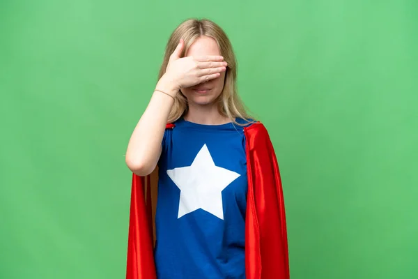Super Hero English woman over isolated background covering eyes by hands. Do not want to see something