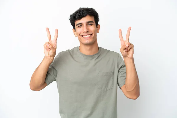 Mladý Argentinský Muž Izolované Bílém Pozadí Ukazující Vítězství Znamení Oběma — Stock fotografie