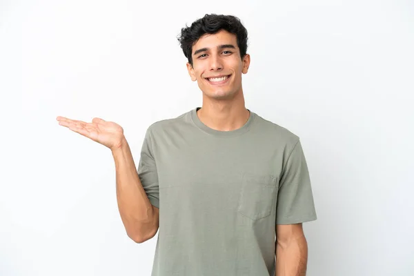 Young Argentinian Man Isolated White Background Holding Copyspace Imaginary Palm — Stock Photo, Image
