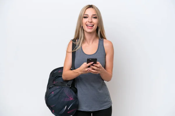 Young Sport Woman Sport Bag Isolated White Background Surprised Sending — Stok fotoğraf