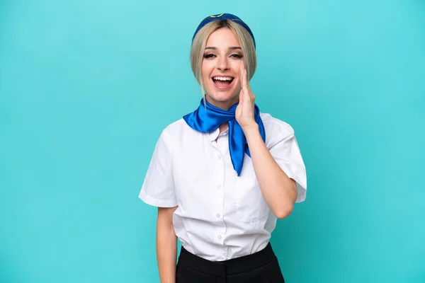 Airplane Blonde Stewardess Woman Isolated Blue Background Shouting Mouth Wide — Stock Photo, Image