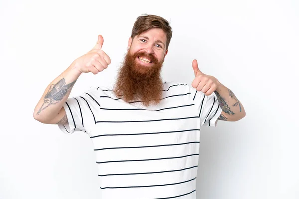 stock image Redhead man with beard isolated on white background giving a thumbs up gesture