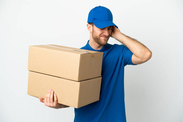 Delivery man over isolated white background frustrated and covering ears
