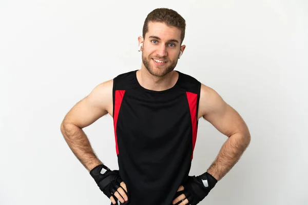 stock image Handsome blonde man over isolated white background posing with arms at hip and smiling