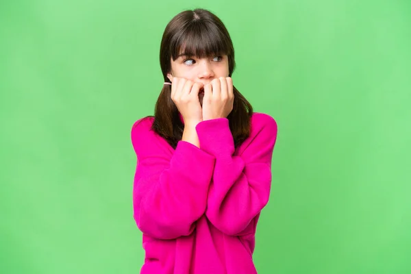 Little Caucasian Girl Isolated Background Nervous Scared Putting Hands Mouth — Stock Photo, Image