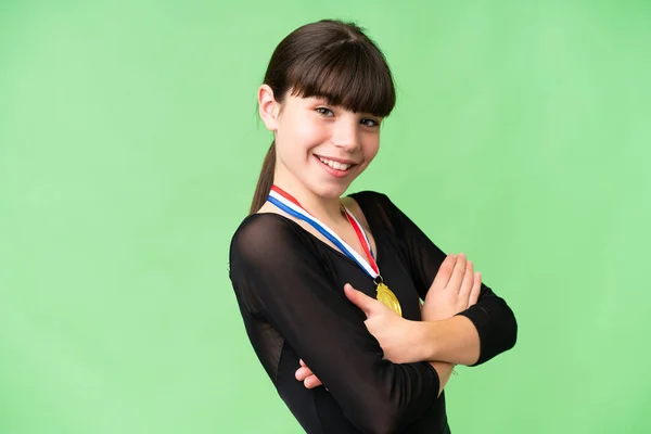 Little Caucasian Girl Medals Isolated Background Arms Crossed Looking Forward — Stock Photo, Image
