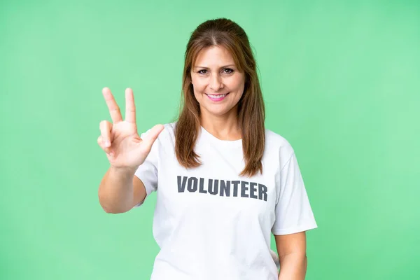 Mujer Voluntaria Mediana Edad Sobre Fondo Aislado Feliz Contar Tres — Foto de Stock