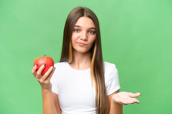 Teenager Běloška Dívka Drží Jablko Přes Izolované Pozadí Dělat Pochybnosti — Stock fotografie