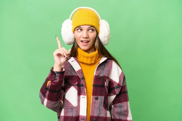 Adolescente Chica Caucásica Con Muffs Invierno Sobre Fondo Aislado Con —  Fotos de Stock