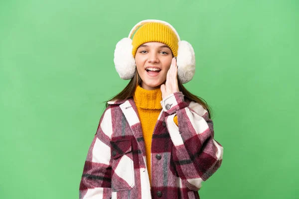 Teenager Caucasian Girl Wearing Winter Muffs Isolated Background Shouting Mouth — Stock Photo, Image