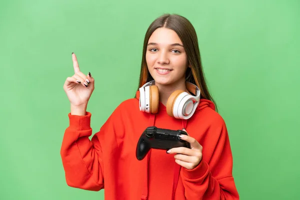 Teenager Caucasian Girl Playing Video Game Controller Isolated Background Pointing — Stock Photo, Image