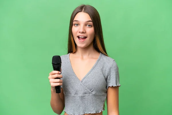 Genç Şarkıcı Kız Izole Edilmiş Bir Arka Planda Sürpriz Bir — Stok fotoğraf