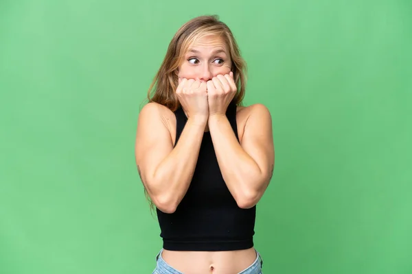 Young Blonde Woman Isolated Background Nervous Scared Putting Hands Mouth — Stock Photo, Image
