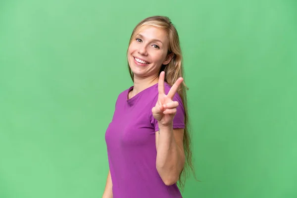 Jong Blond Vrouw Geïsoleerde Achtergrond Glimlachen Tonen Overwinning Teken — Stockfoto
