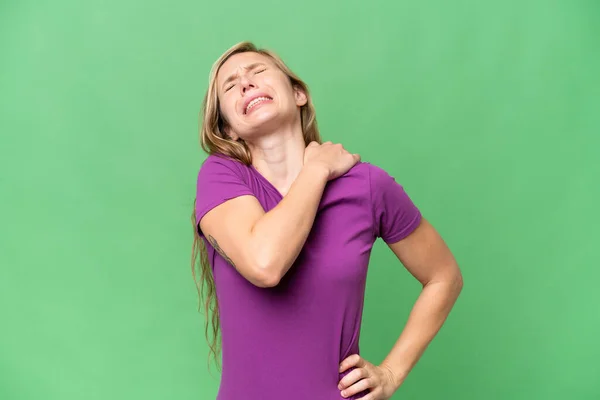 Young Blonde Woman Isolated Background Suffering Pain Shoulder Having Made — Stock Photo, Image