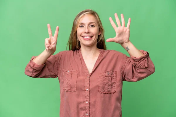 Mladá Blondýna Žena Přes Izolované Pozadí Počítání Sedm Prsty — Stock fotografie