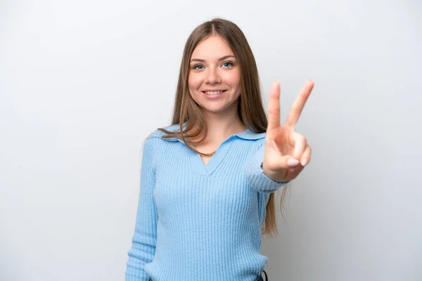 若いリトアニアの女性は白い背景笑顔で孤立し 勝利の兆候を示す — ストック写真