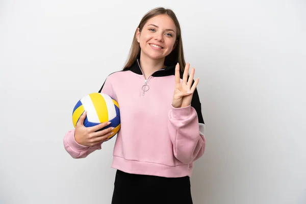 stock image Young Lithuanian woman playing volleyball isolated on white background happy and counting four with fingers