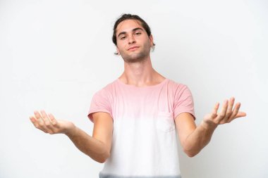Caucasian handsome man isolated on white background having doubts