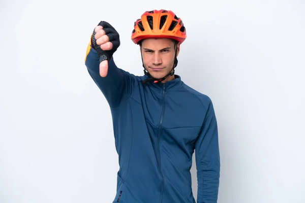 Young Cyclist Caucasian Man Isolated White Background Showing Thumb Negative —  Fotos de Stock
