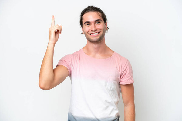 Caucasian handsome man isolated on white background pointing up a great idea