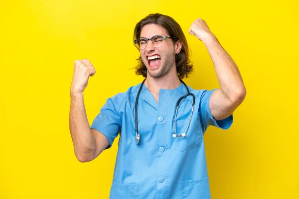 Young Surgeon Caucasian Man Isolated Yellow Background Celebrating Victory — Stock Photo, Image