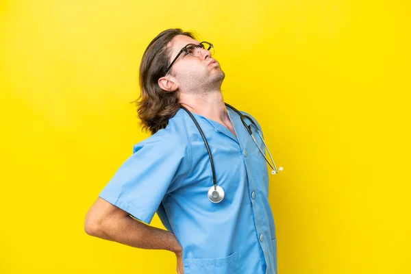Young Surgeon Caucasian Man Isolated Yellow Background Suffering Backache Having — Stock Photo, Image
