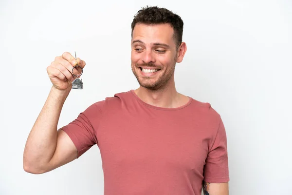 Young Caucasian Man Holding Home Keys Isolated White Background Happy — Stockfoto