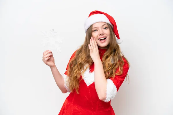 若いですCaucasian女性とともにクリスマスドレス保持雪の結晶隔離された上に白い背景ささやき何か — ストック写真