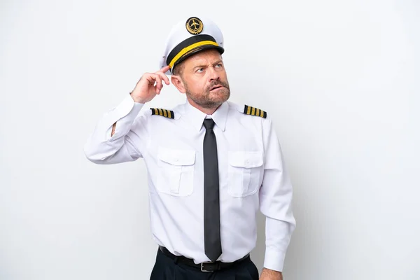 Airplane Middle Age Pilot Isolated White Background Having Doubts Confuse — Fotografia de Stock