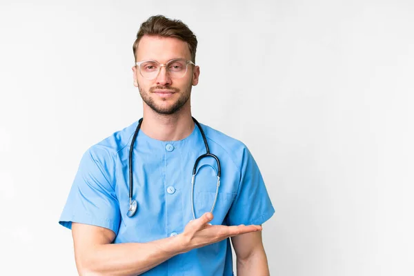 Young Nurse Man Isolated White Background Presenting Idea While Looking — Stock Photo, Image