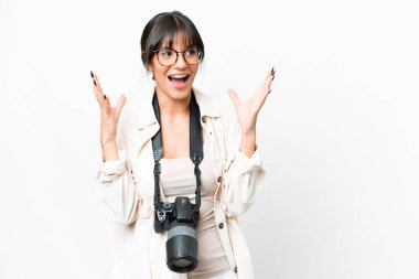 Young photographer caucasian woman over isolated white background with surprise facial expression