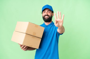Delivery caucasian man over isolated chroma key background happy and counting four with fingers
