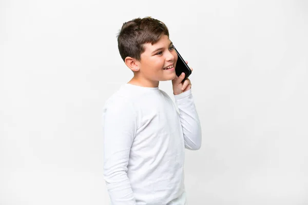 배경을 코카서스 아이가 휴대폰으로 대화를 있습니다 — 스톡 사진